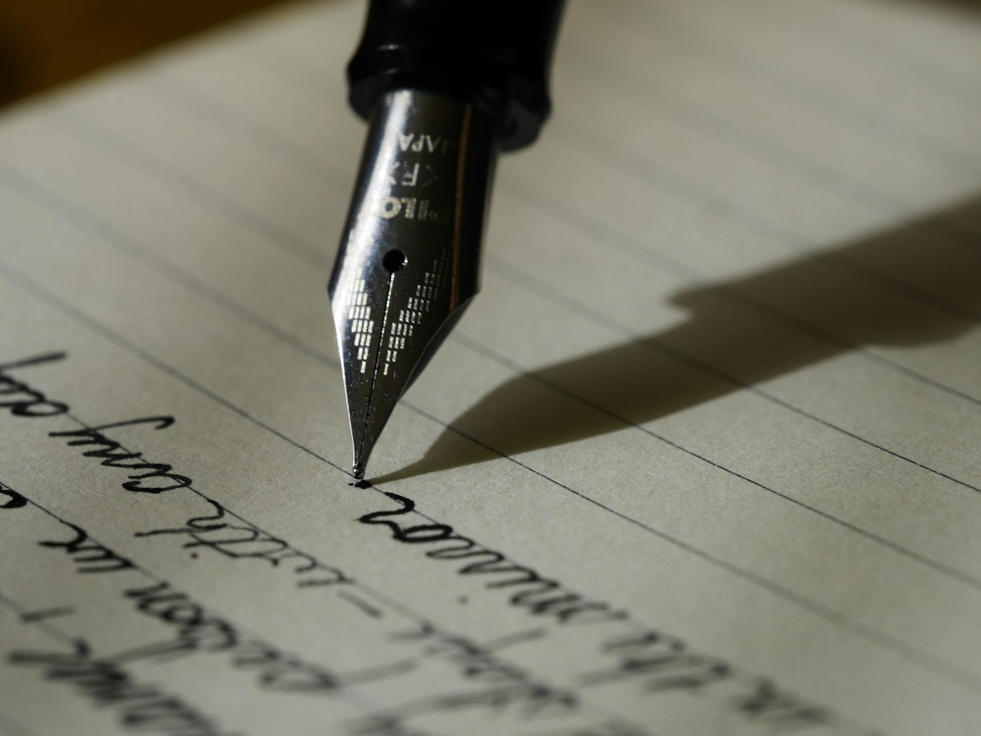 Manuscript and pen